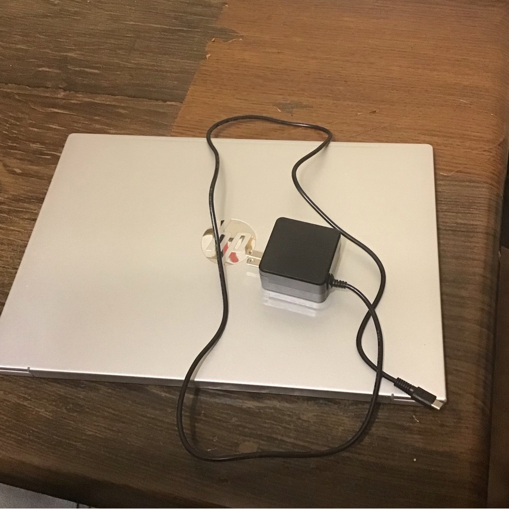 HP Silver Laptop with Black Charger